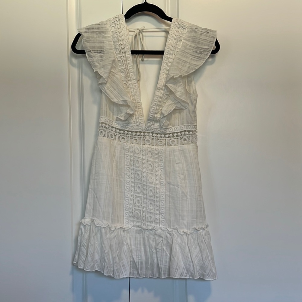 NWOT. White dress. No label. Size xxs. 00. Shirt is lined. Fun beach/party dress